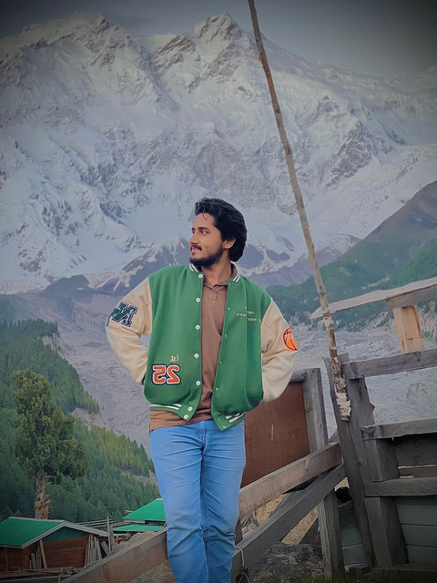Waleed with snow-covered mountains in northern Pakistan